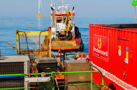 Wind farm offshore energy wind turbine construction on the North Seaの写真素材