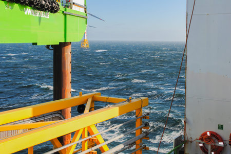 Wind farm offshore energy wind turbine construction on the North Seaの写真素材