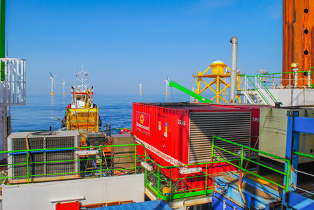 Wind farm offshore energy wind turbine construction on the North Seaの写真素材