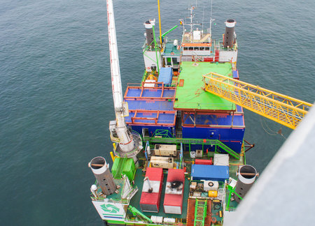 Wind farm offshore energy wind turbine construction on the North Seaの写真素材