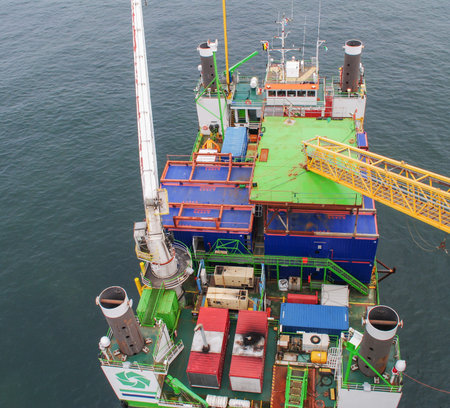 Wind farm offshore energy wind turbine construction on the North Seaの写真素材