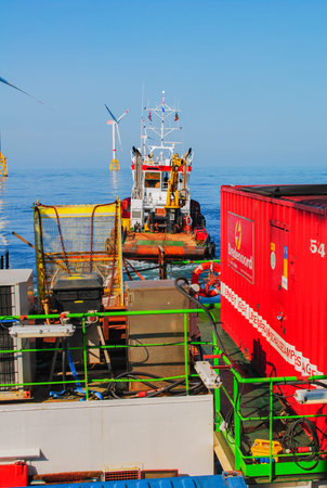 Wind farm offshore energy wind turbine construction on the North Seaの写真素材