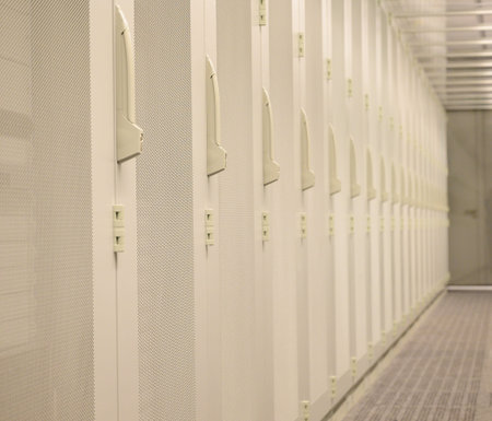 Server racks with built-in servers in a data centerの写真素材