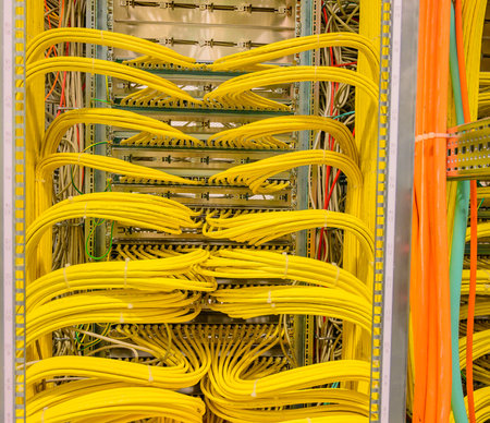 RJ45 copper cable - Network Cable in a network distribution rack in the data centerの写真素材