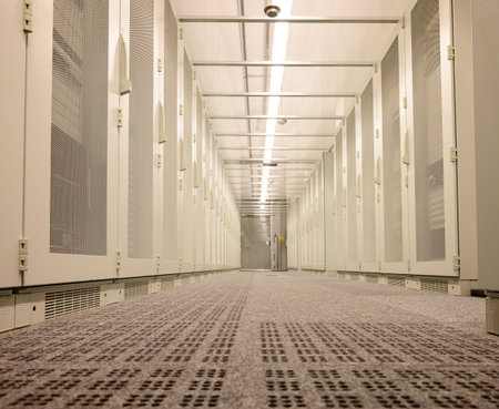 Server racks with built-in servers in a data centerの写真素材