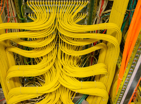 RJ45 copper cable - Network Cable in a network distribution rack in the data centerの写真素材