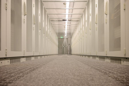 Server racks with built-in servers in a data centerの写真素材