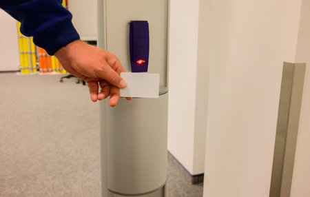 Hold the access card in front of an access system in a data centerの写真素材