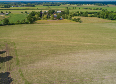 Drone aerial view of various agricultural fields in Schleswig Holstein Germanyの写真素材