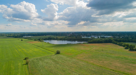 Drone aerial view of various agricultural fields in Schleswig Holstein Germanyの写真素材