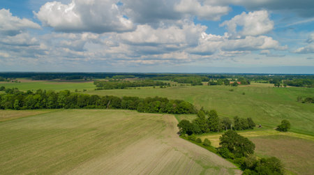 Drone aerial view of various agricultural fields in Schleswig Holstein Germanyの写真素材