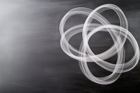 A knot theory diagram showcases trefoil knots with intersecting loops and mathematical notations on a dark background.の素材