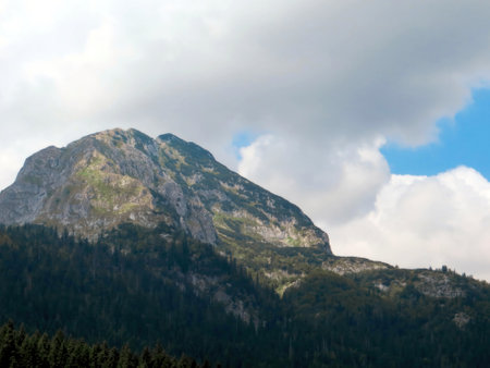 Visitors can hike mount Bobotov kuk in Durmitor National Park, Montenegro, enjoying stunning landscapes, fresh air, and diverse flora while surrounded by majestic mountains.の写真素材