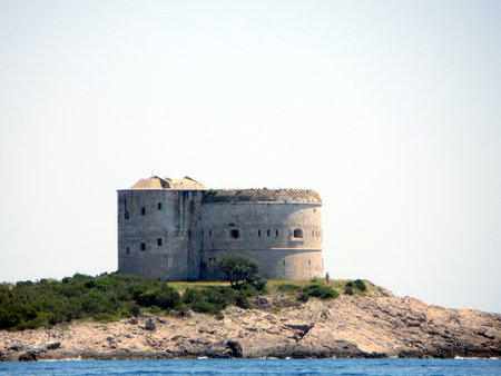 Fort Arza stands as a captivating landmark on the Lustica Peninsula, overlooking the stunning Adriatic coast. This historical site invites exploration and admiration.の写真素材