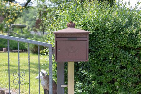 Metal Post Box in Germany in the Gardenの写真素材