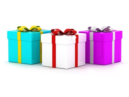 Three colourful gift boxes with ribbons. Isolated on white.の写真素材