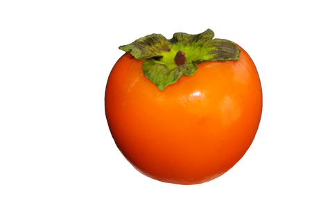Vitamin fruit persimmon flaunts on an isolated white backgroundの写真素材