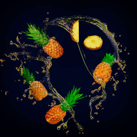 Juicy tasty pineapple with splashes of juice is full of vitaminsの写真素材