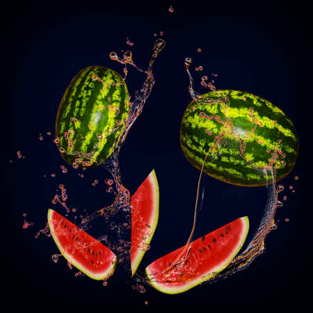 Juicy tasty watermelon with splashes of juice is full of vitaminsの写真素材