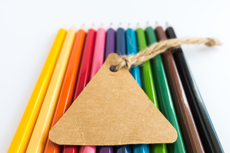Vintage Sale Tags on Colour pencils backgroundの写真素材