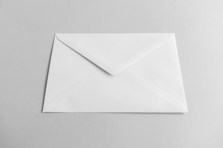 Blank envelope on gray background.の写真素材