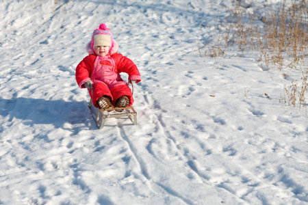 child and Sledges