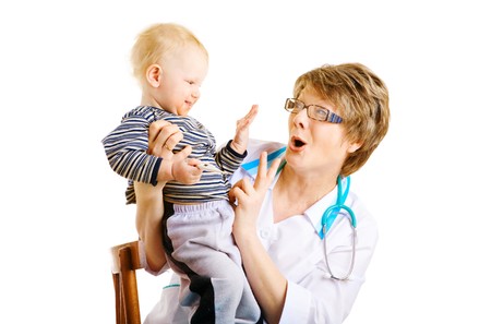 child and doctor with thermometrの写真素材