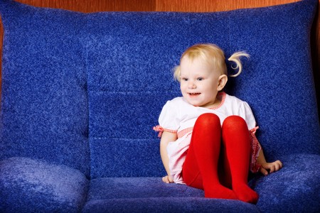 pretty child in the armchairの写真素材