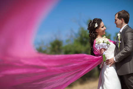 bride and groom with the pink shawlの写真素材
