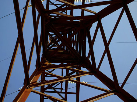 under the electric tower and in the background sky