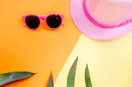 Straw Beach Womans Hat Sun Glasses Top View Yellow Background Flat Singleの写真素材