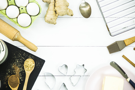 ingredients and tools for baking ginger biscuits - food and kitchen utensilsの写真素材