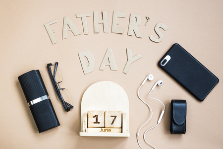Father's Day. Men's accessories on a beige background. International holiday on June 17, 2018の写真素材