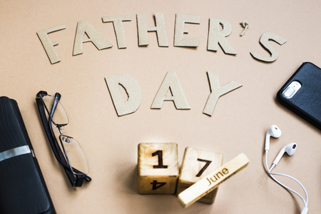Father's Day. Men's accessories on a beige background. International holiday on June 17, 2018の写真素材