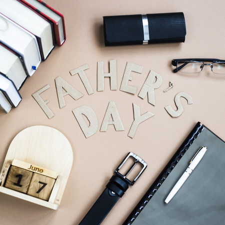 Father's Day. Men's accessories on a beige background. International holiday on June 17, 2018の写真素材