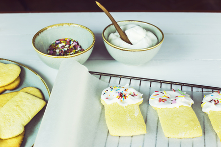 The process of making cookies in the form of pasoks on a white kitchen table. Homemade conceptの写真素材