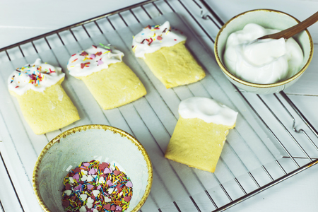 The process of making cookies in the form of pasoks on a white kitchen table. Homemade conceptの写真素材