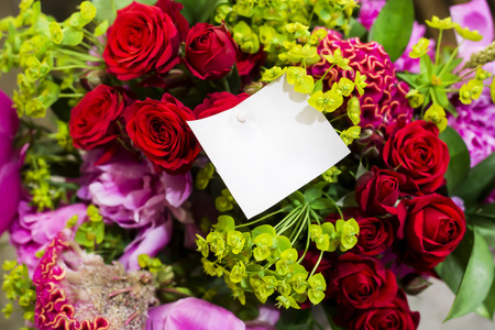 Beautiful modern bouquet of roses with a place for writing. Copyspaceの写真素材