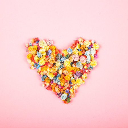 Creative spring and valentines day layout of the heart made of many