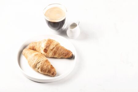 Croissants and coffee in the style of minimalism.の写真素材