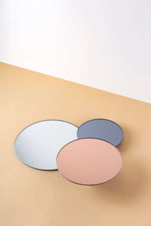 Three round stands for objects with mirrored surfacesの写真素材