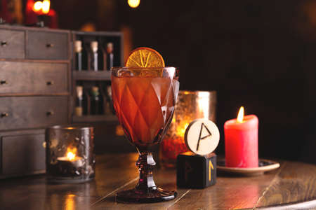 Fresh red cocktail with lemon in the witchs restaurantの写真素材
