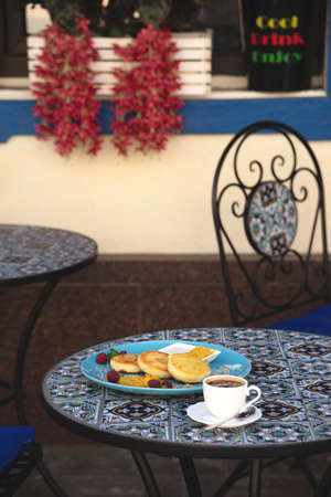 Cheese pancakes in a restaurant with a beautiful presentationの写真素材