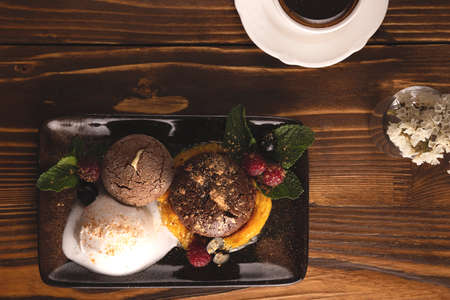 Nicely served chocolate fondant with ice cream. Food stylingの写真素材