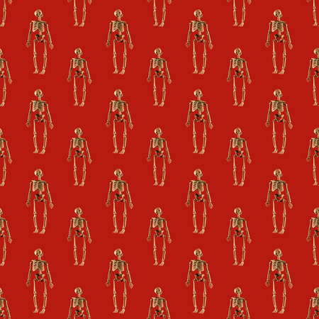 Seamless pattern of scaring halloween skeletons on bright backgroundの写真素材