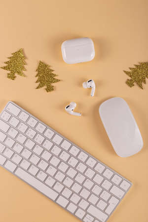Minimalistic Stylish computer workplace among Christmas decorationsの写真素材