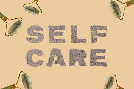 Self care an inscription on a beige neutral background made of natural clay