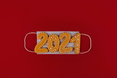 Protective mask with festive sparkles and stars on red background