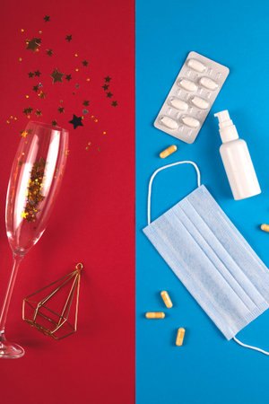 Christmas during a pandemic concept. Champagne or medicineの写真素材