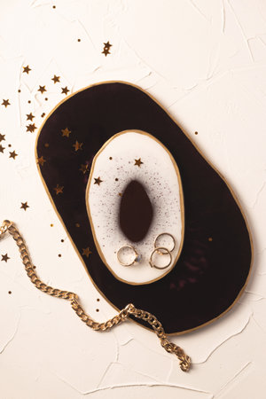 Jewelry on a stylish epoxy resin stand. Top viewの写真素材